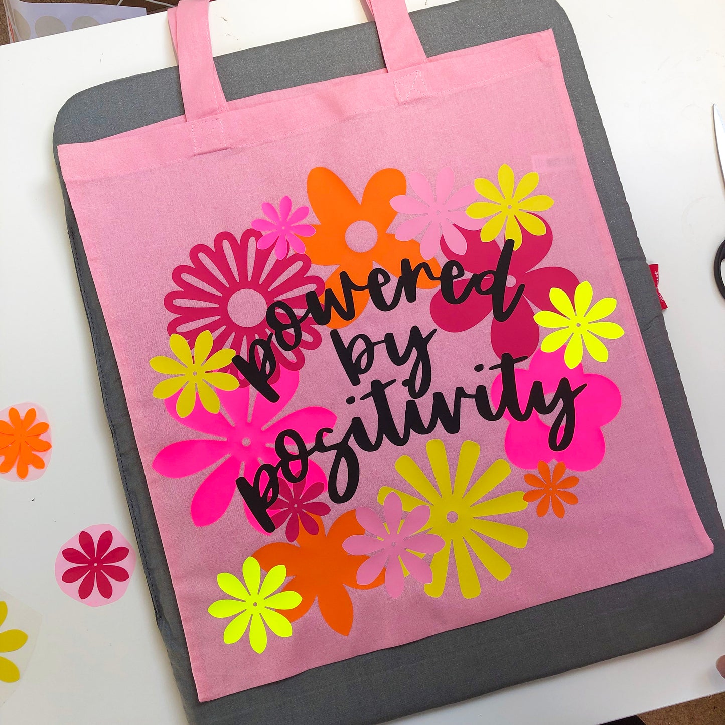POWERED BY POSITIVITY tote bag