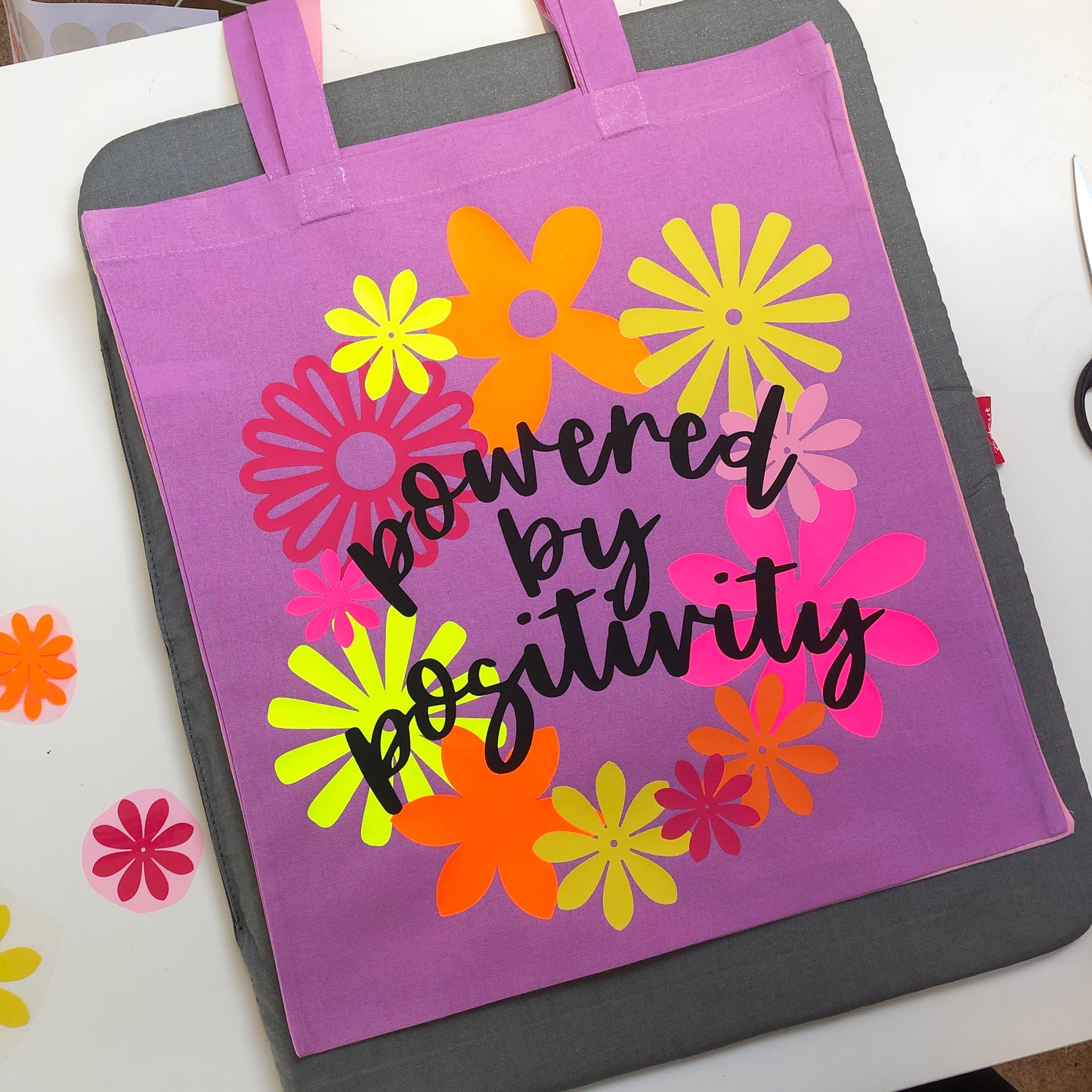 POWERED BY POSITIVITY tote bag