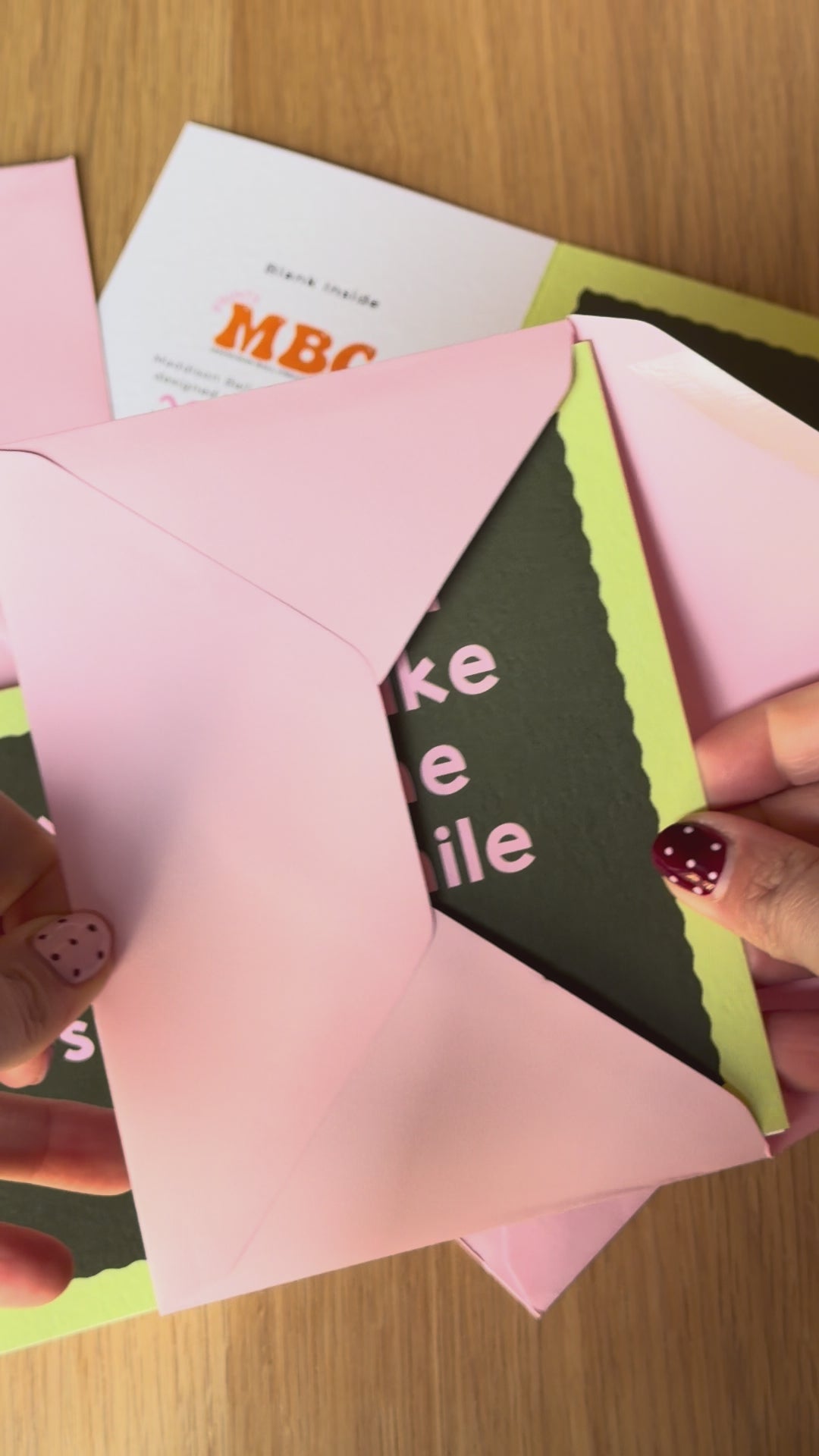 Card with 'you make me smile' text on a colorful background